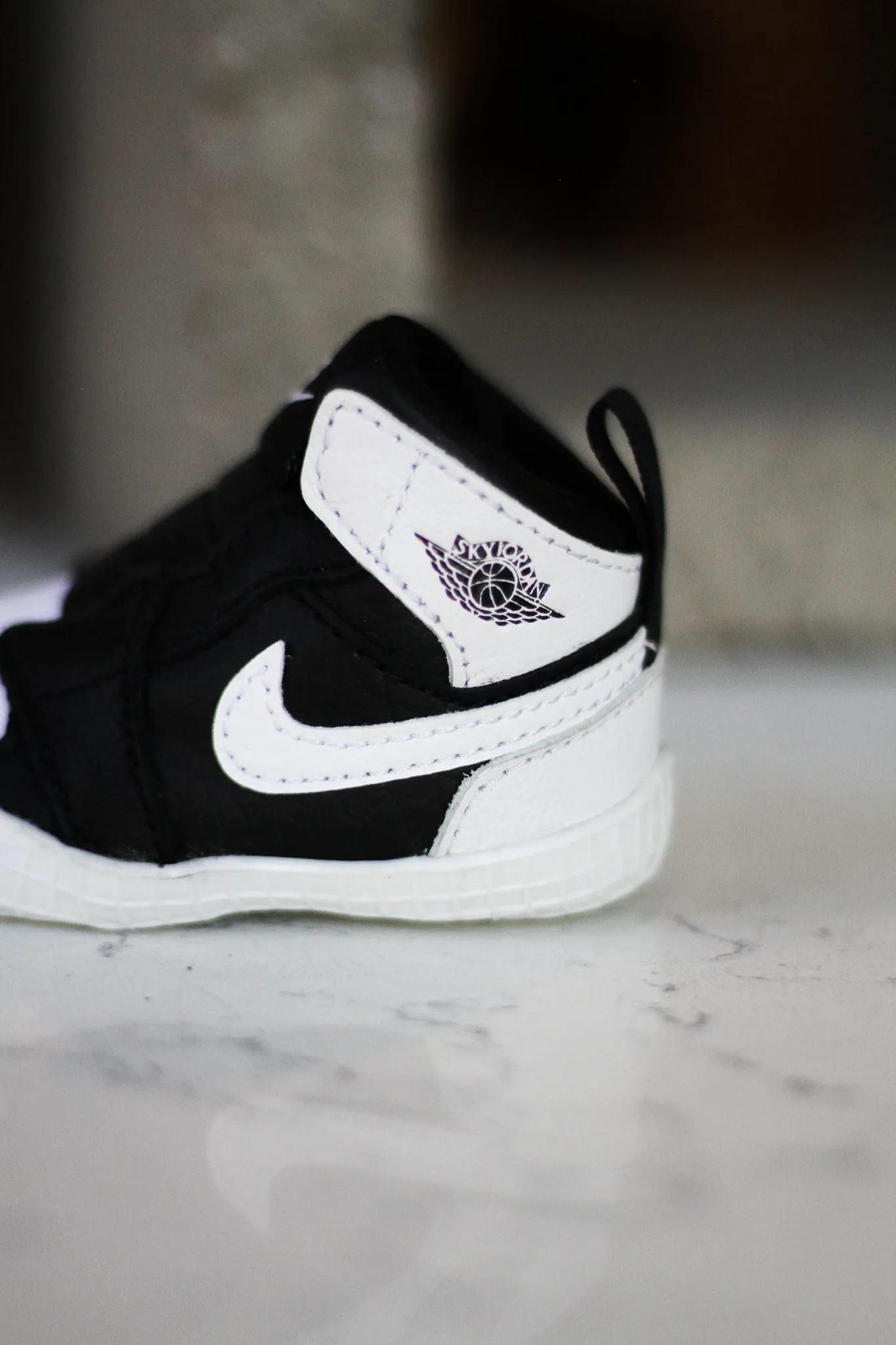 JORDAN 1 BOOTIE (CB) "BLACK/WHITE"